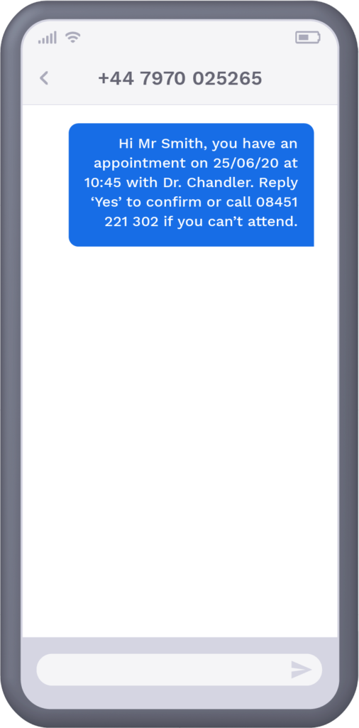 Phone with text message from healthcare provider to recipient, reminding them of upcoming appointment