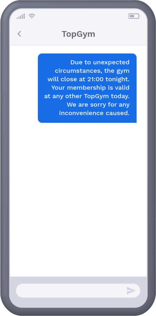 Phone showing text message from gym notifying recipient of unexpected temporary closure