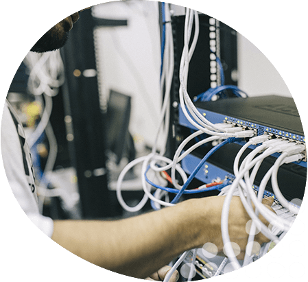 Photo of engineer working on data boards