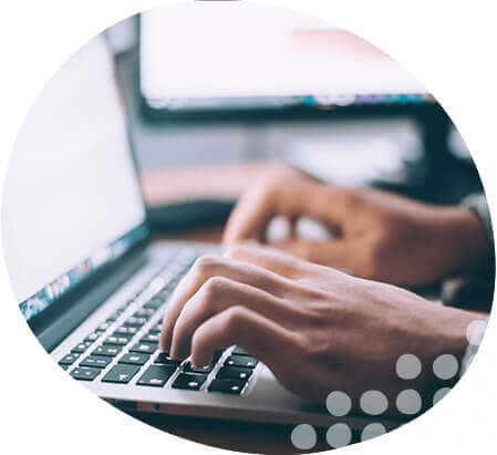 Person on laptop keyboard